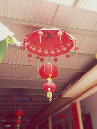 Low angle view of red lanterns hanging