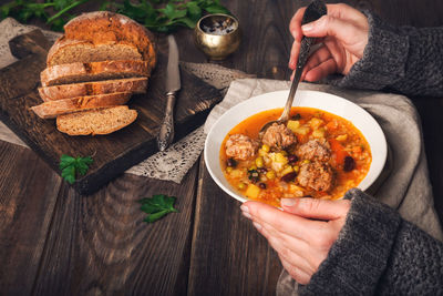 Midsection of person preparing food