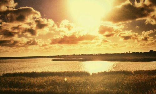 Scenic view of sunset over river