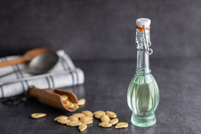 Close-up of wine bottles on table