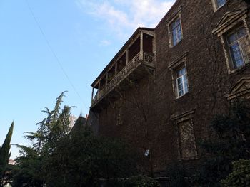 Low angle view of old building against sky