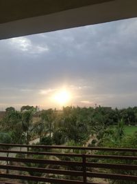 Scenic view of field against sky during sunset