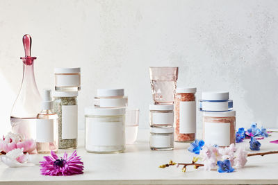 Collection of bath salts with flowers