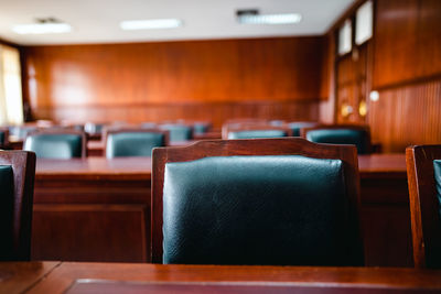 Close-up of empty seats on table