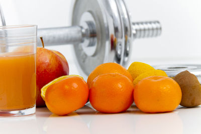 Close-up of orange fruits on table