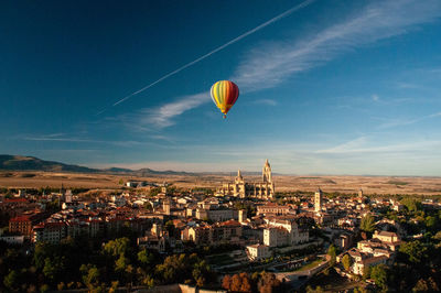 High angle view of hot air balloon against blue sky in segovia