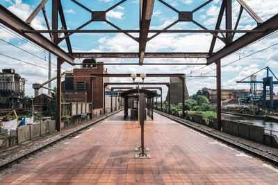 Railroad station platform against sky