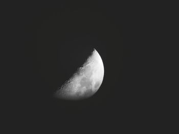 Low angle view of moon against sky at night
