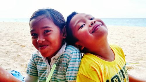 Portrait of smiling boy on beach