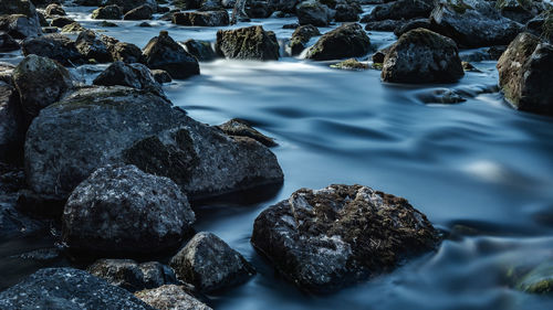 Running swedish river in the spring with large rocks