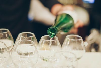 Close-up of glasses on table