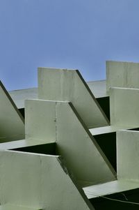 Low angle view of building against blue sky