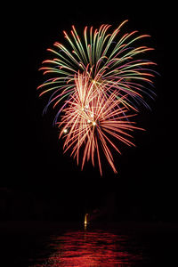 Firework display at night