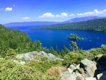 Scenic view of lake against blue sky