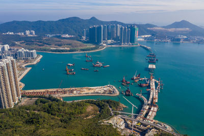 High angle view of boats in city