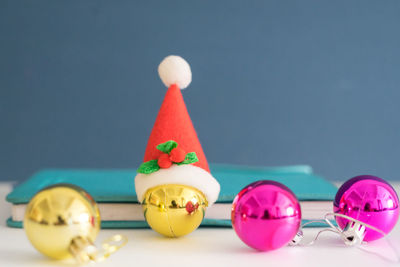 Close-up of toys on table against blue background