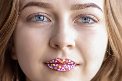 Close-up portrait of young woman