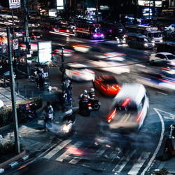 High angle view of light trails on city street