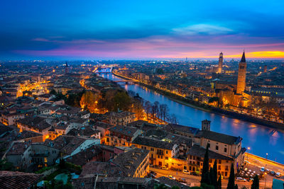 High angle view of illuminated buildings in city