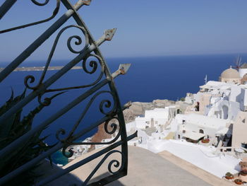 Panoramic view of sea and buildings against sky