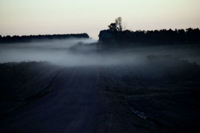 Scenic view of landscape against sky during sunset