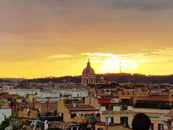 High angle view of townscape against sky at sunset