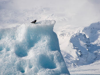 High angle view of people on snow covered mountain