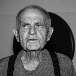 Close-up of mature man looking away