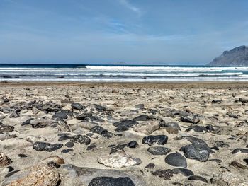 Scenic view of beach against sky