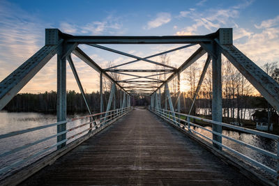 Bridge over footbridge against sky