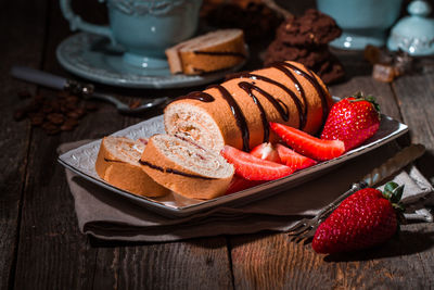 Close-up of strawberries in plate on table