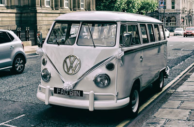 View of cars parked on road