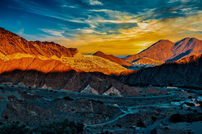 Scenic view of mountain against sky during sunset