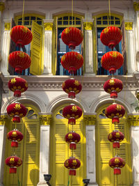 Close-up of lanterns hanging in row