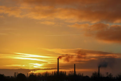 Scenic view of dramatic sky during sunset