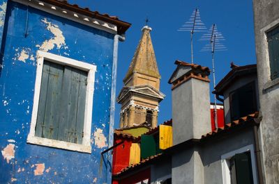 Low angle view of temple against clear blue sky