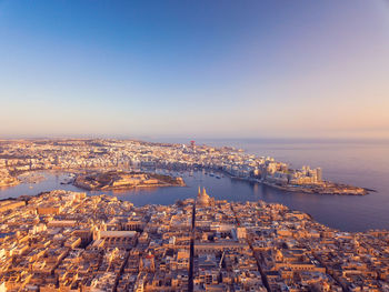 Aerial view of valletta city in malta during sunrise.