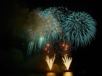 Firework display at night