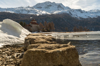 Silvaplana, switzerland, february 21, 2023 winter landscape scenery with a frozen lake of silvaplana