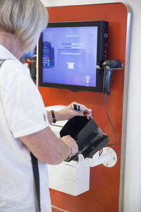 Woman paying with credit card