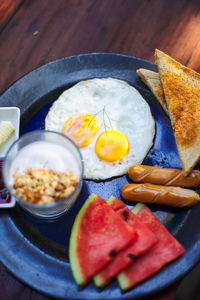 Close-up of breakfast served on table