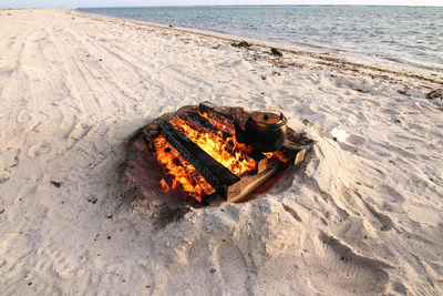 High angle view of bonfire on beach