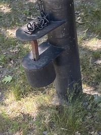 High angle view of metal chain on field