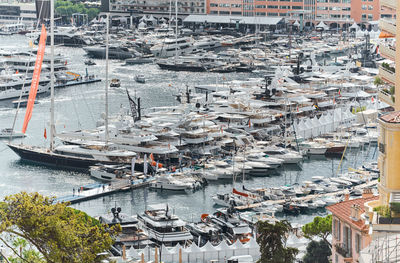 Boats moored at harbor