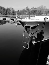 Boats moored at harbor
