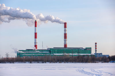 Air pollution from a natural gas and coal power plant. emissions harmful substances into atmosphere.