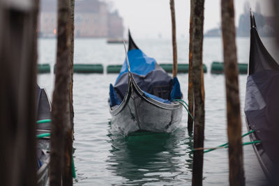 Close-up of boat moored on sea