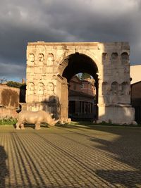 Old ruin building against cloudy sky