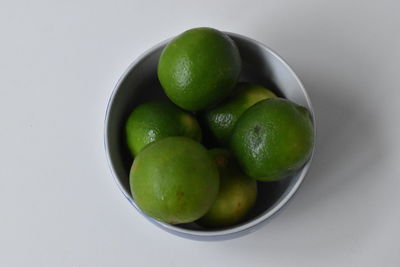 Directly above shot of green fruits in bowl