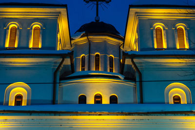 Yellow building against blue sky